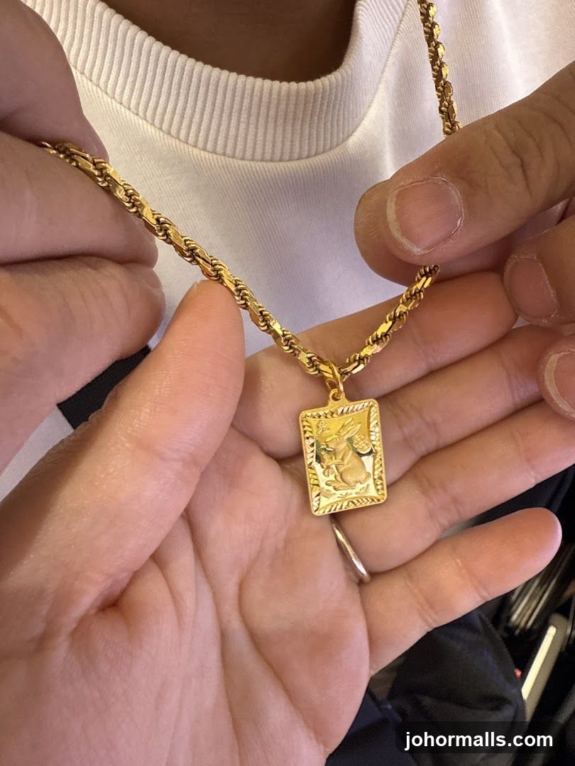 Gold Necklace with Rabbit Pendant
