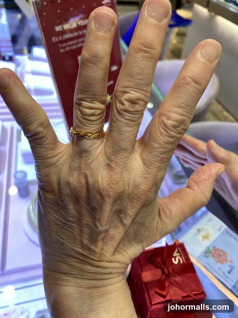 Hand with Ring and Gift Box