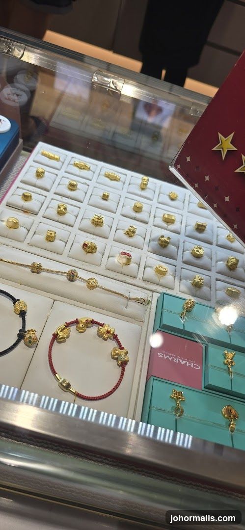 Gold Charms and Bracelets Display