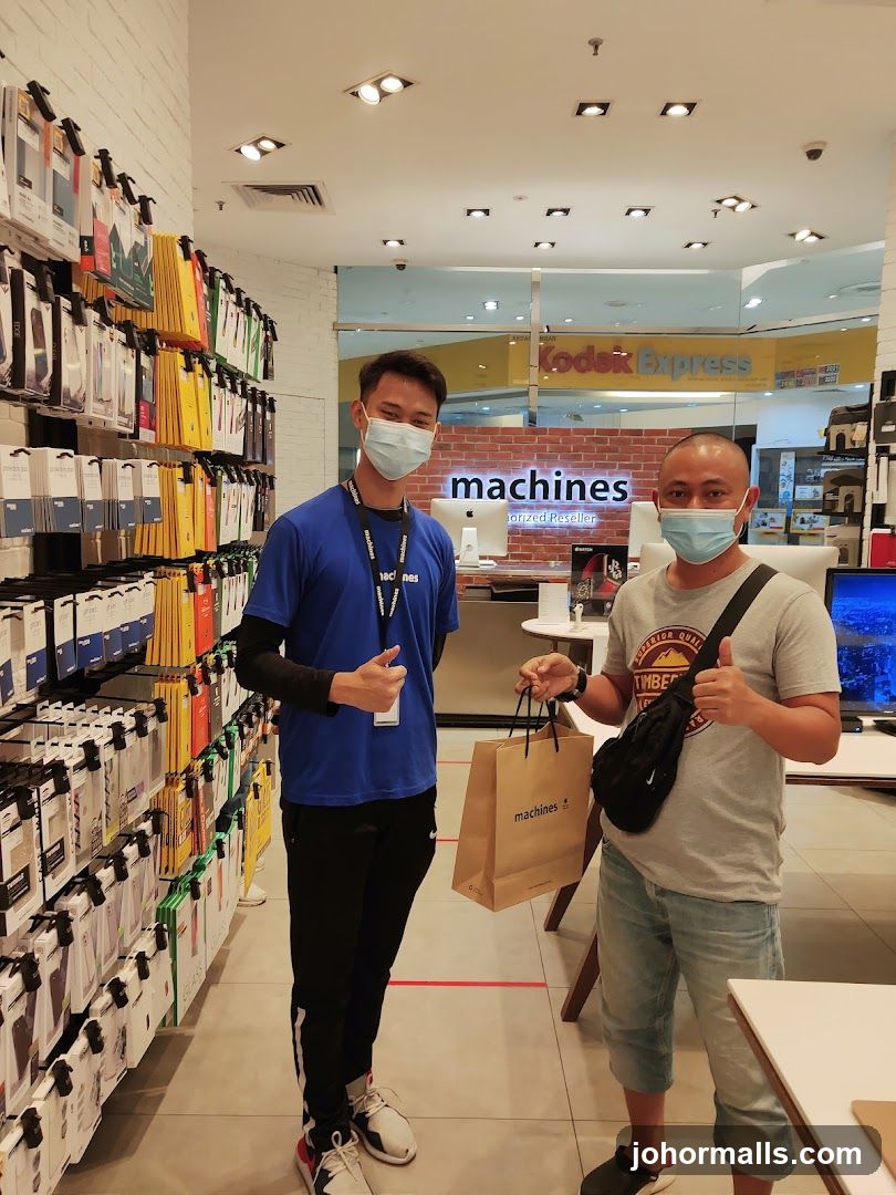 Store Interior with Staff and Customer