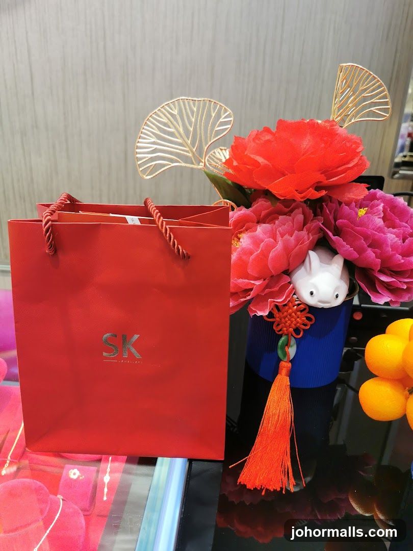 Red Shopping Bag with Floral Arrangement