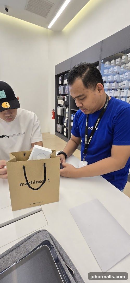 Store Employees Assisting Customer