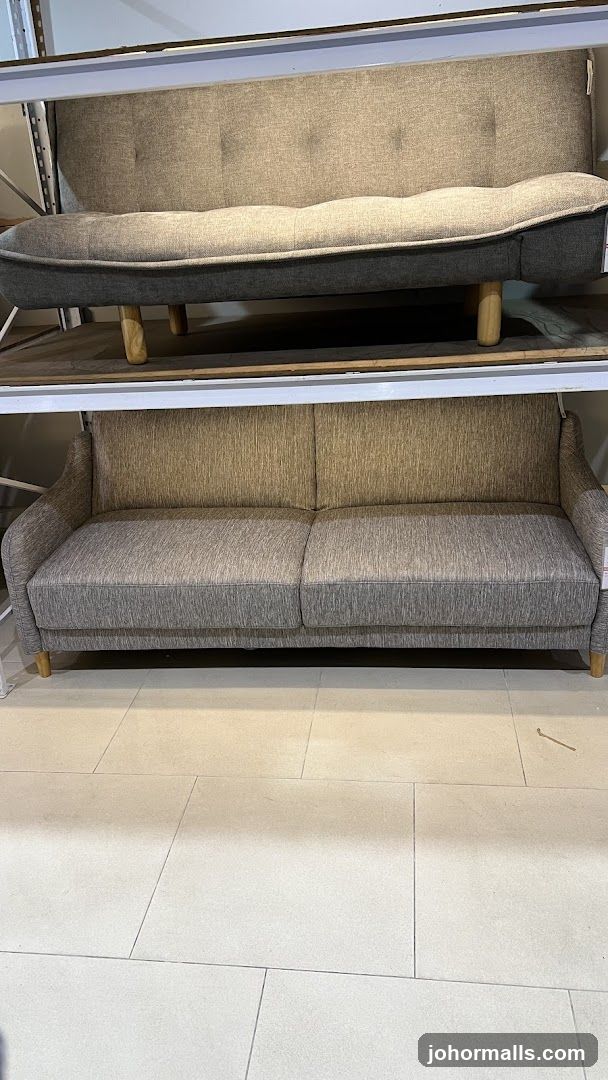 Two sofas on display shelves