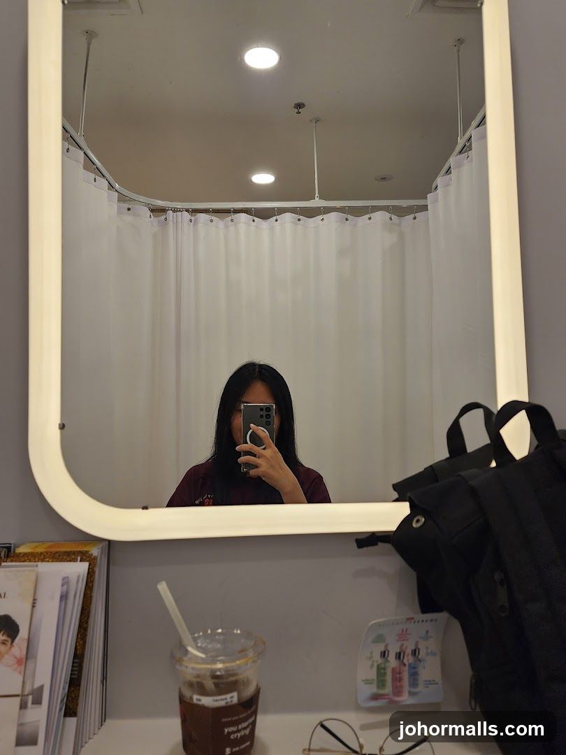 Person taking a selfie in a mirror