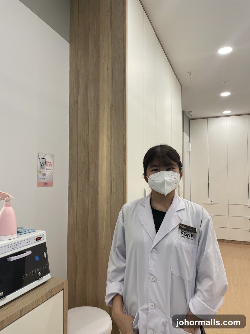 Staff Member in Lab Coat