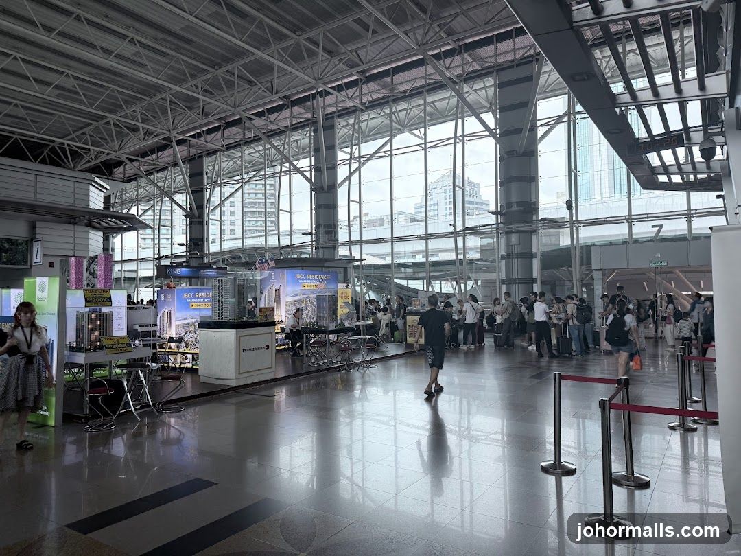Indoor Exhibition Hall with People and Displays