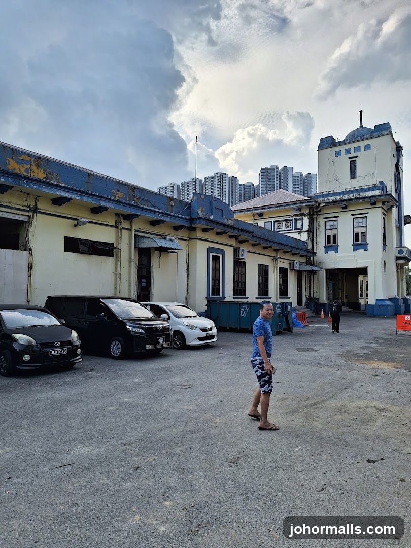 Man walking in front of a building