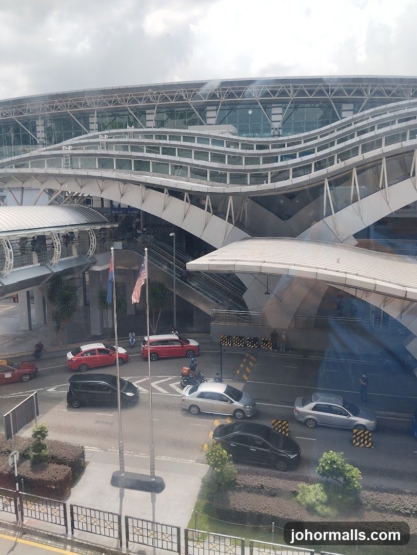 Modern Building Exterior with Traffic