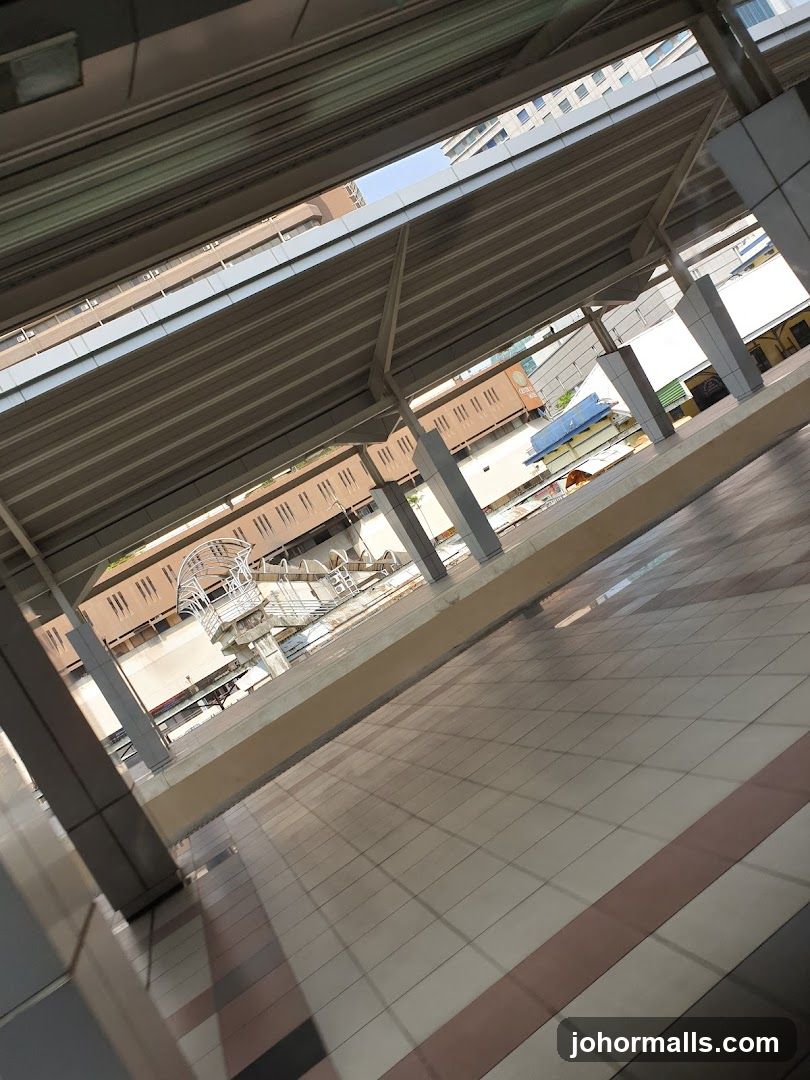 Covered walkway with buildings in the background