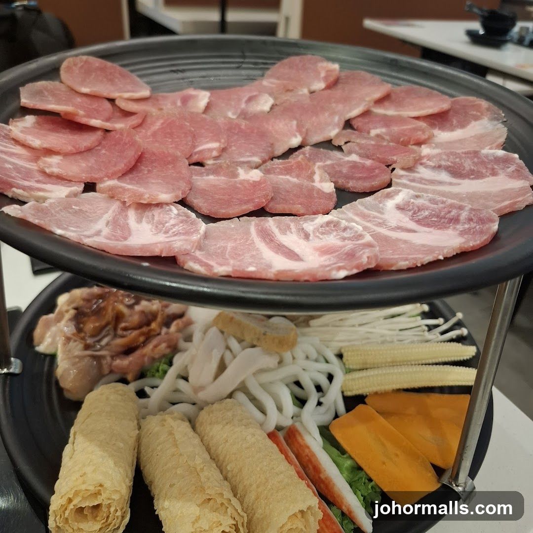 Two-Tiered Platter of Raw Meats and Vegetables