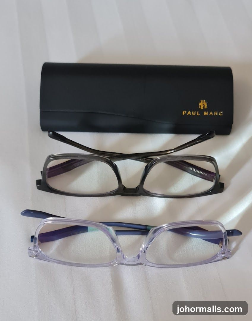 Two pairs of glasses and a case