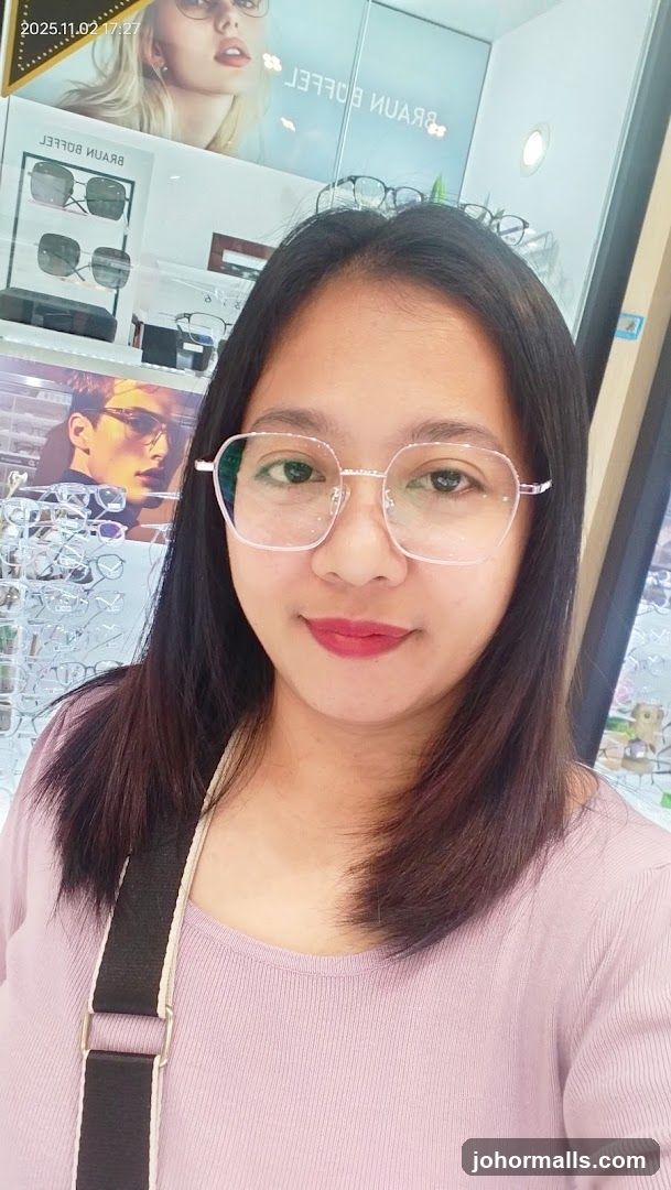 Woman wearing glasses in an optical shop