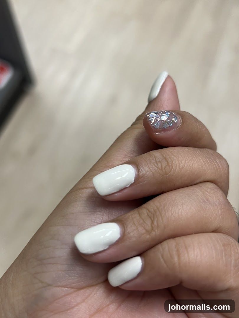 White Nails with Glitter Accent