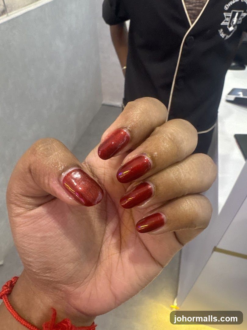 Woman's hand with red nails