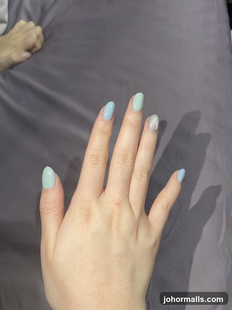 Hand with pastel nails