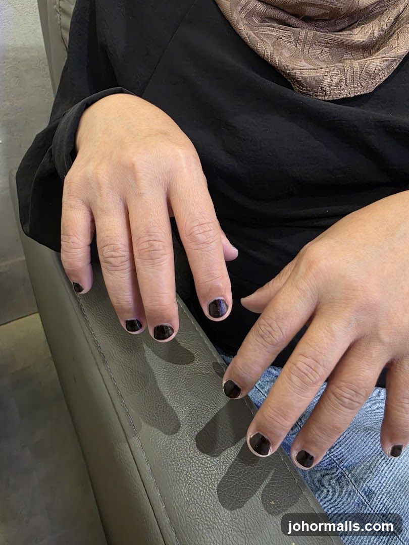 Hands with Dark Nail Polish
