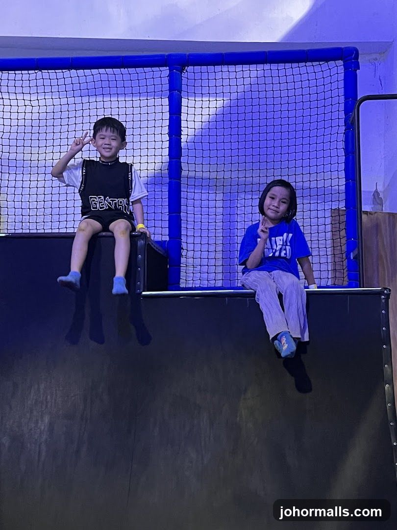 Children sitting on a ledge