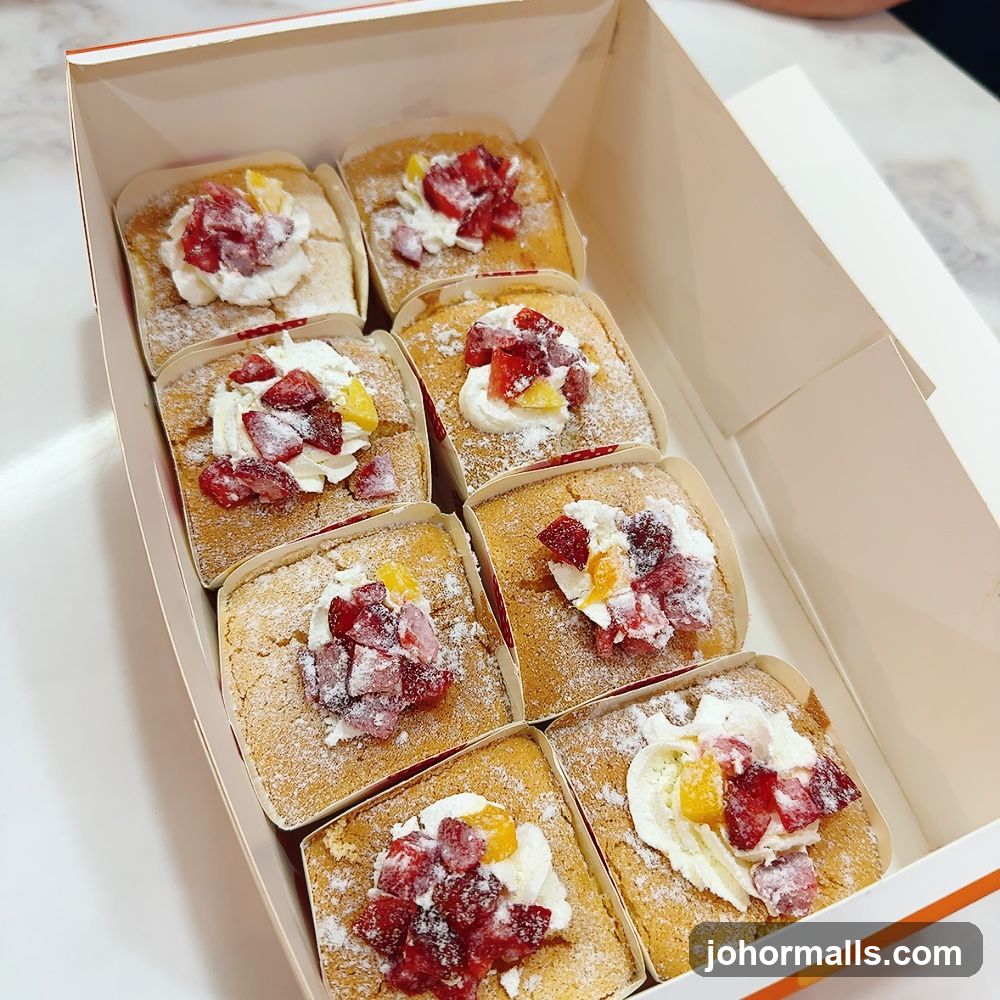 Box of Mini Cakes with Fruit and Cream