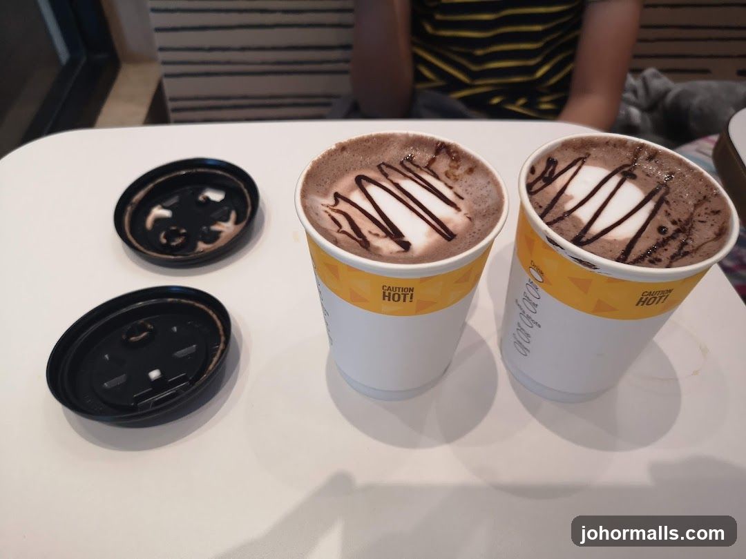 Two hot chocolates with latte art