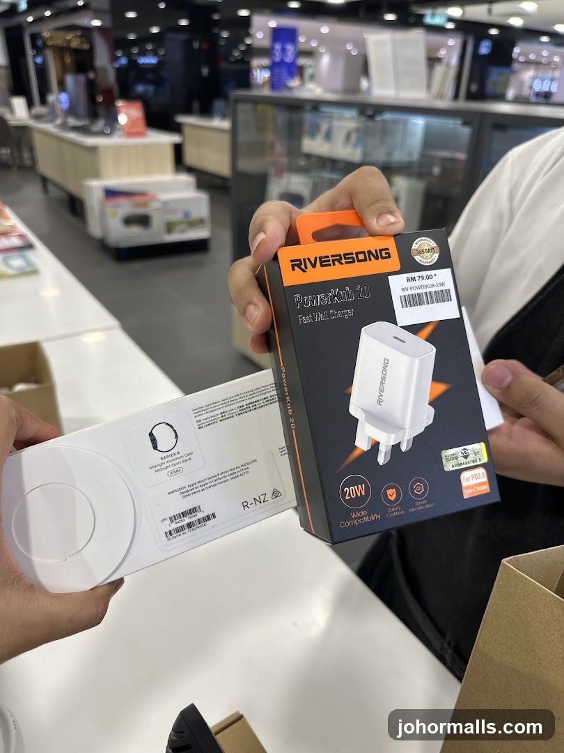 Person holding electronic accessories