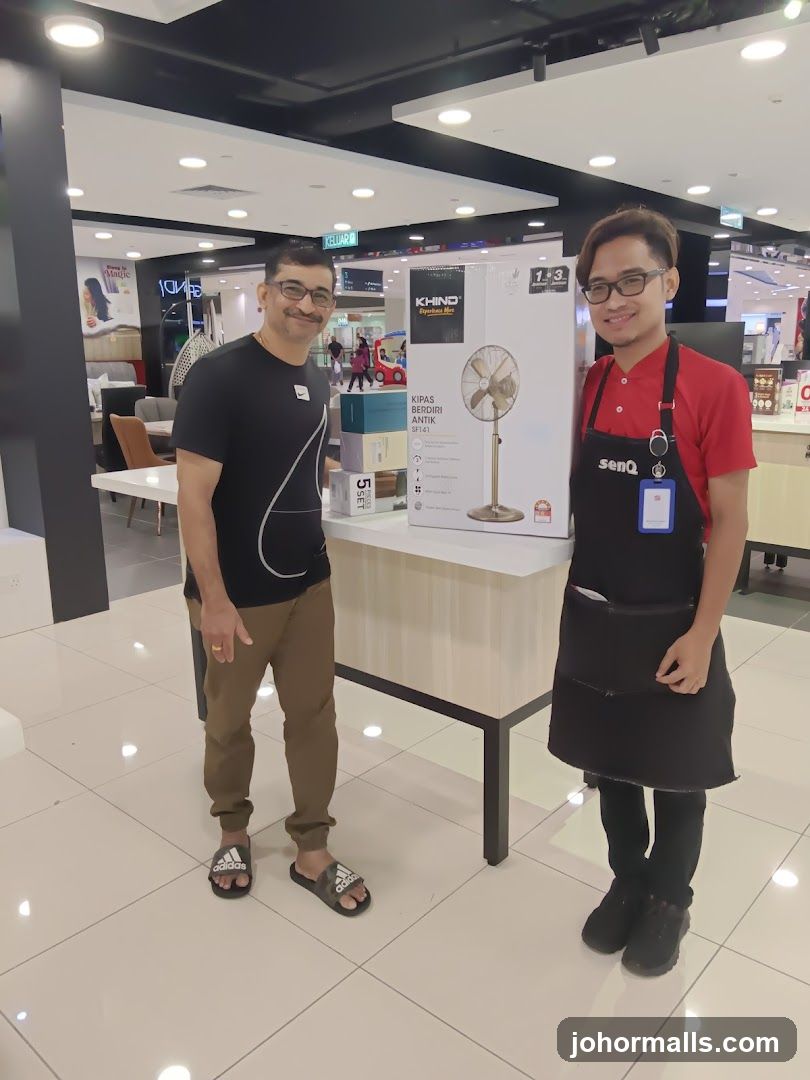 Customer and Staff with Fan Box