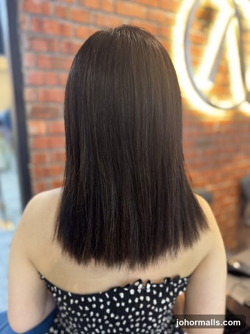 Woman with freshly cut dark hair
