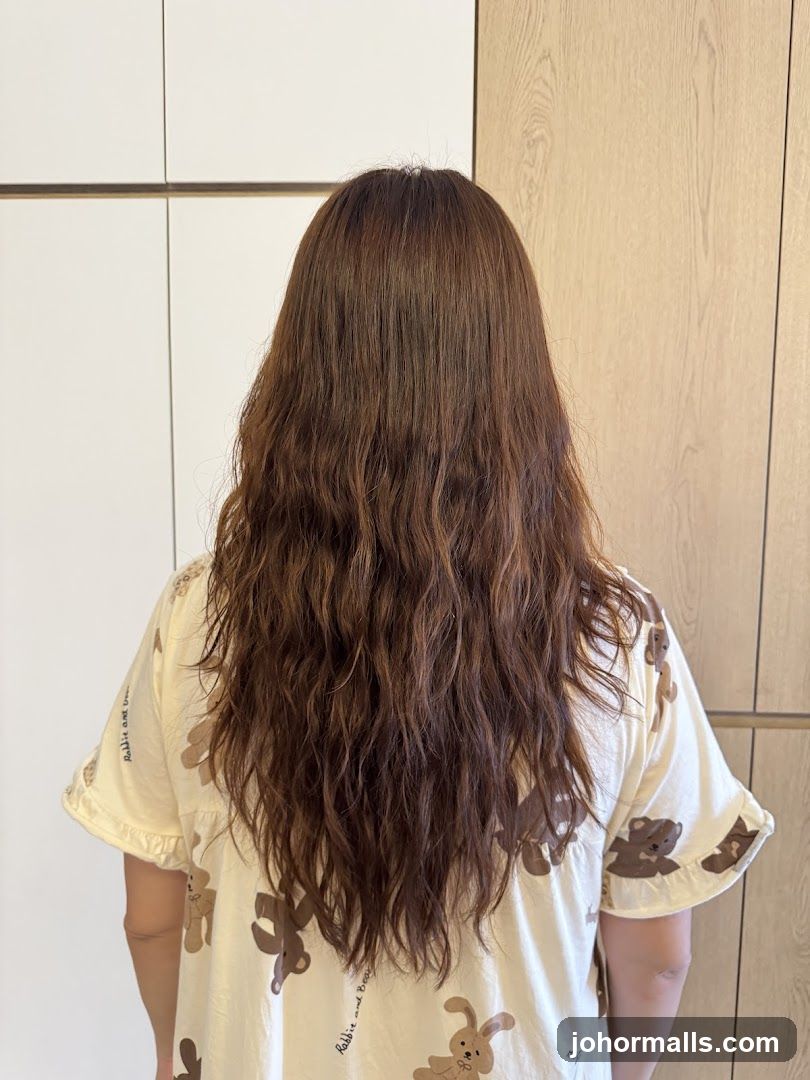 Woman's Back with Long Wavy Brown Hair
