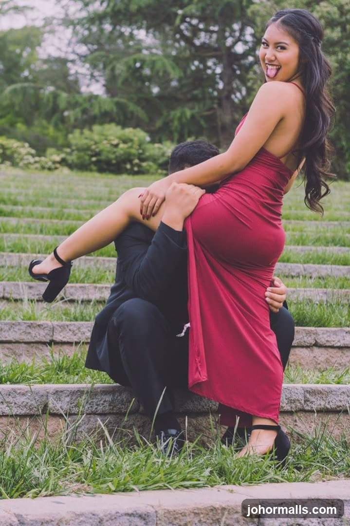 Couple posing on steps