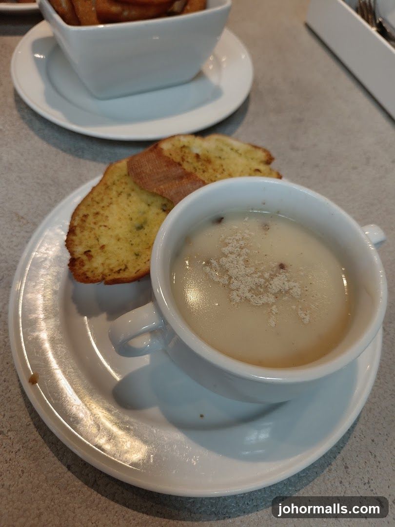Creamy Soup with Garlic Bread