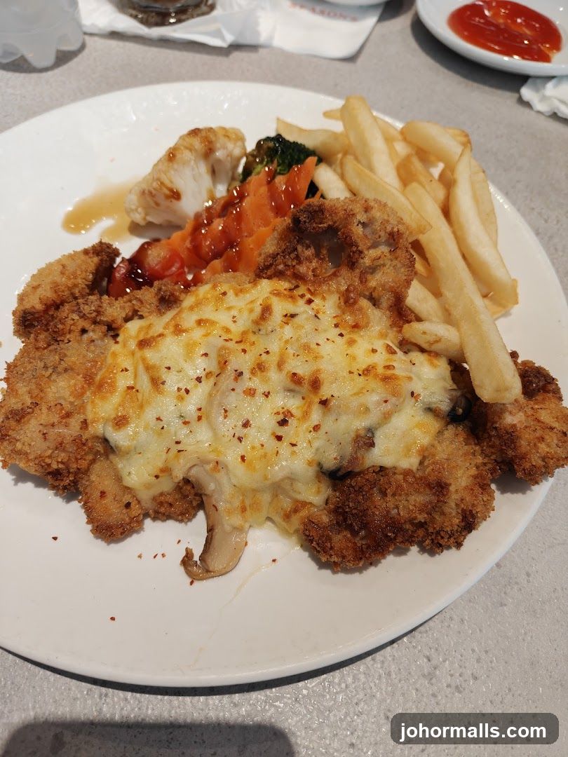 Breaded Chicken with Cheese and Fries