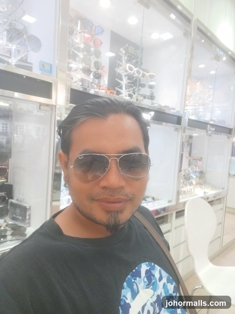 Man in Sunglasses in Eyewear Store