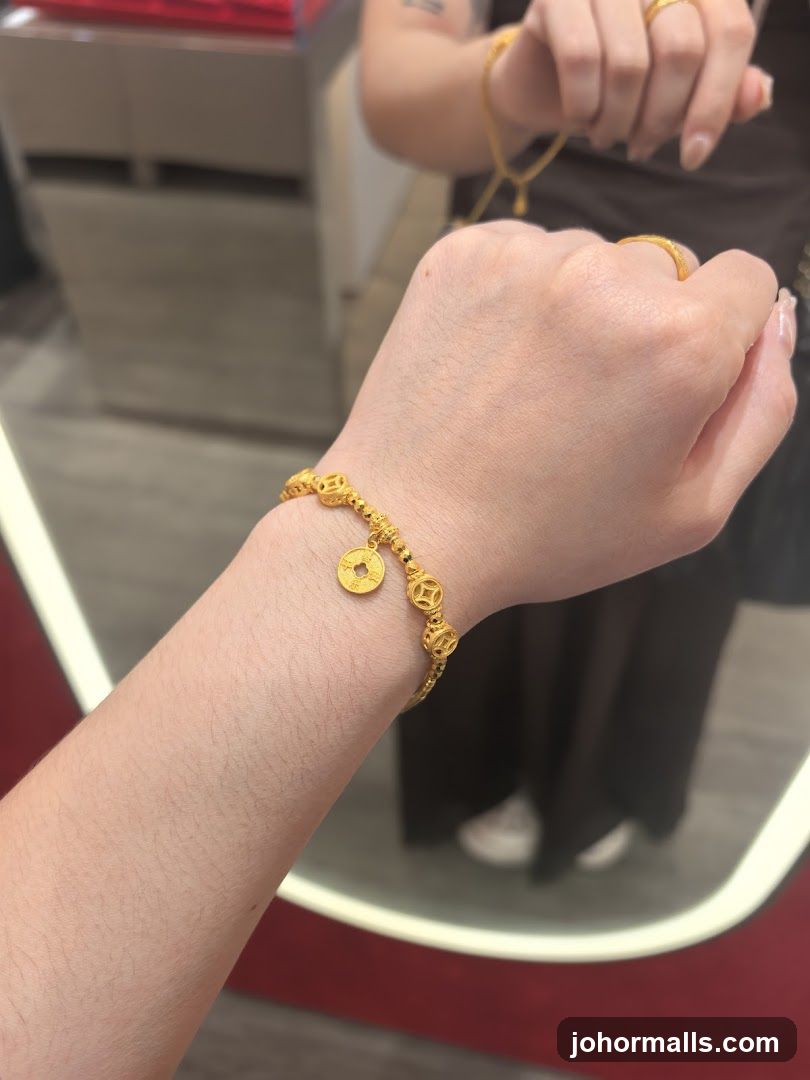 Gold Bracelet with Coin Charms