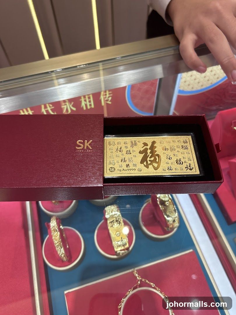 Gold Bar and Jewelry Display