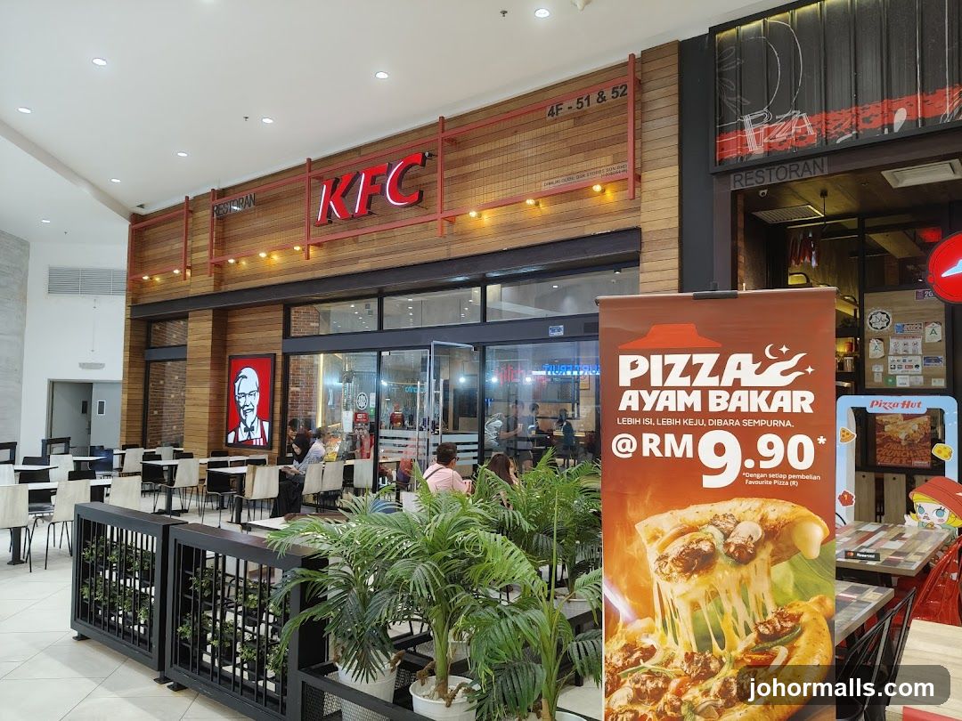 KFC and Pizza Hut storefront with promotional banner
