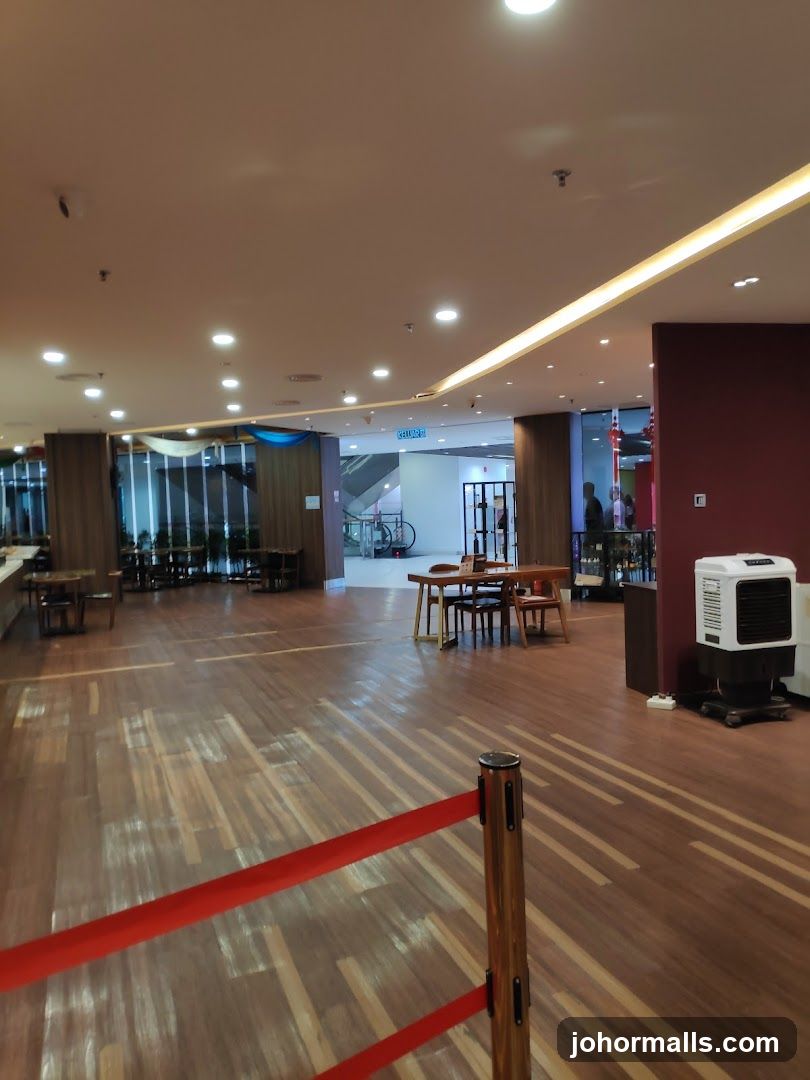 Indoor seating area with wooden tables and chairs