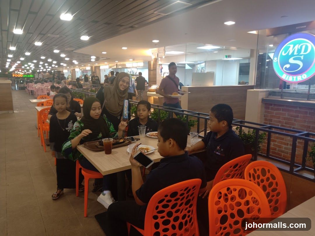 People dining at a food court