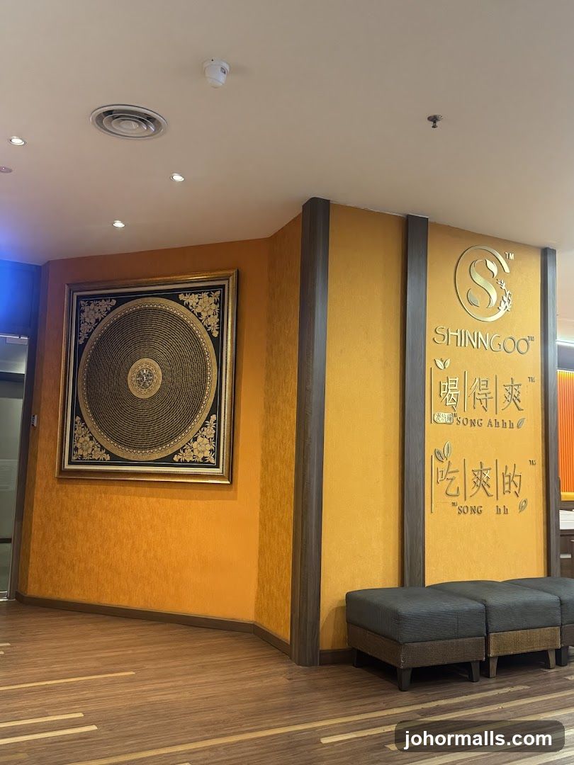 Interior of a restaurant with artwork and seating