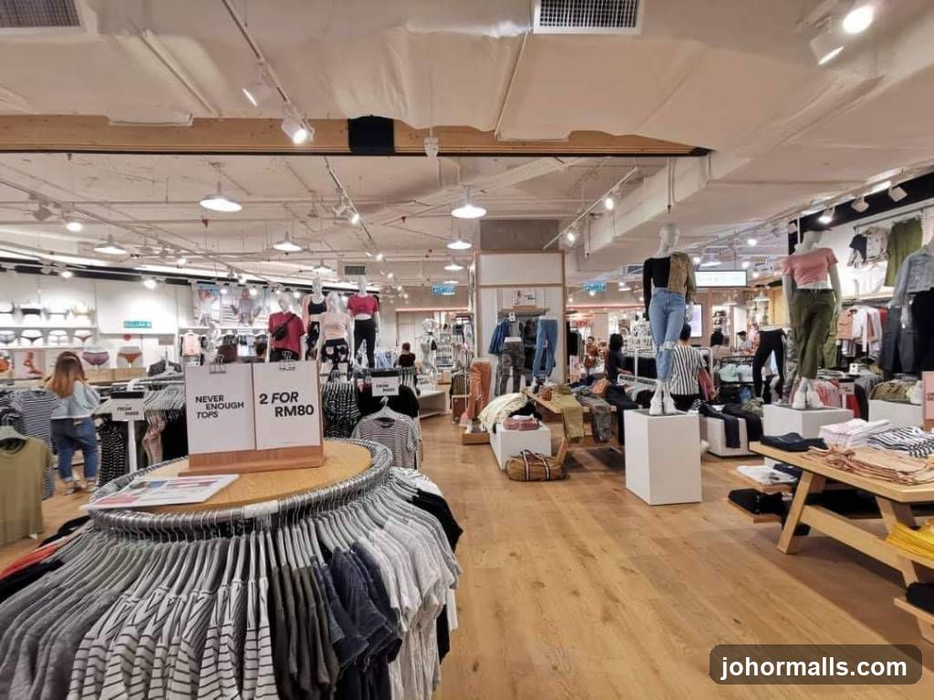 Clothing store interior with mannequins and racks of clothes