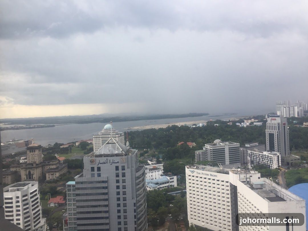 Cityscape with River and Stormy Sky