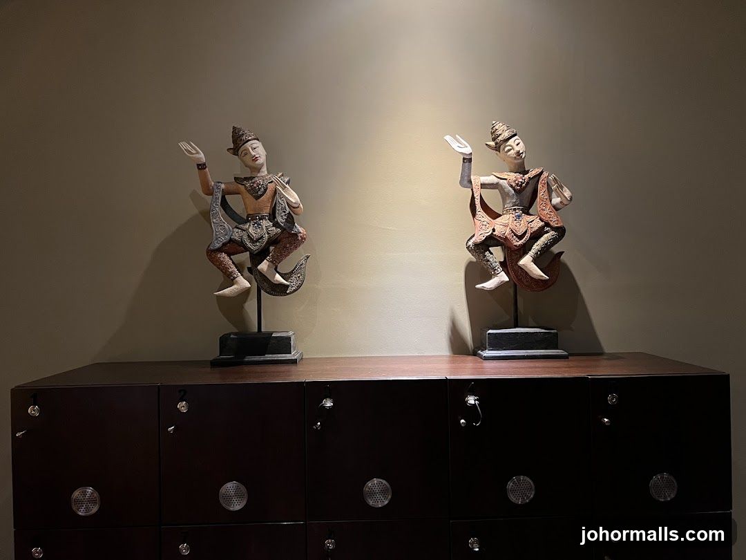 Two Thai Dancer Statues on Lockers