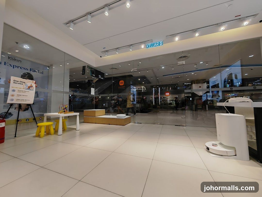 Store Interior with Display and Robot Vacuum