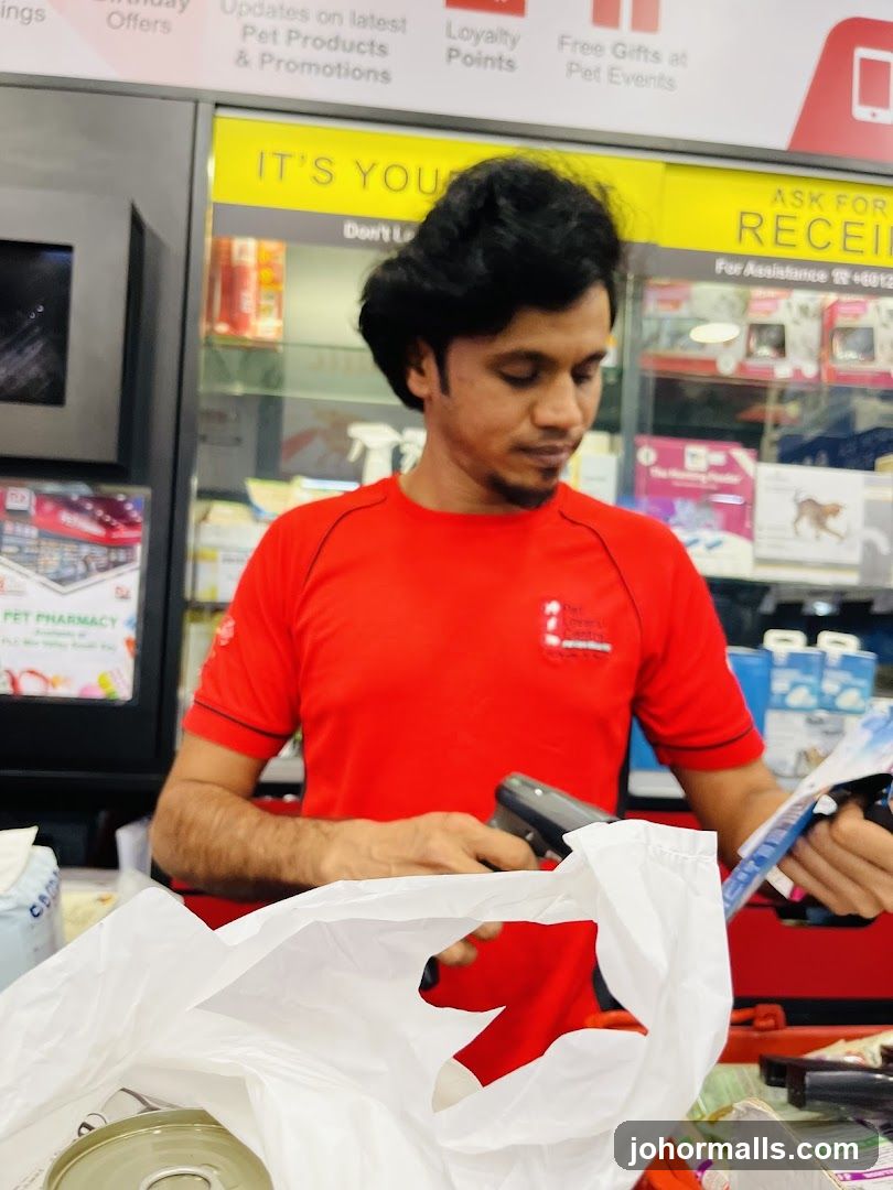 Pet Pharmacy Employee Scanning Items