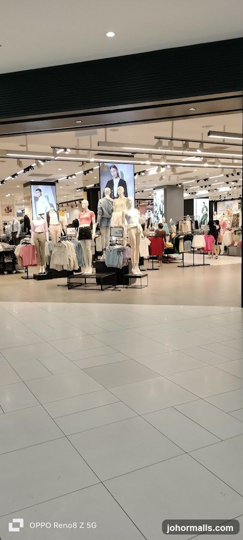 Clothing store interior with mannequins