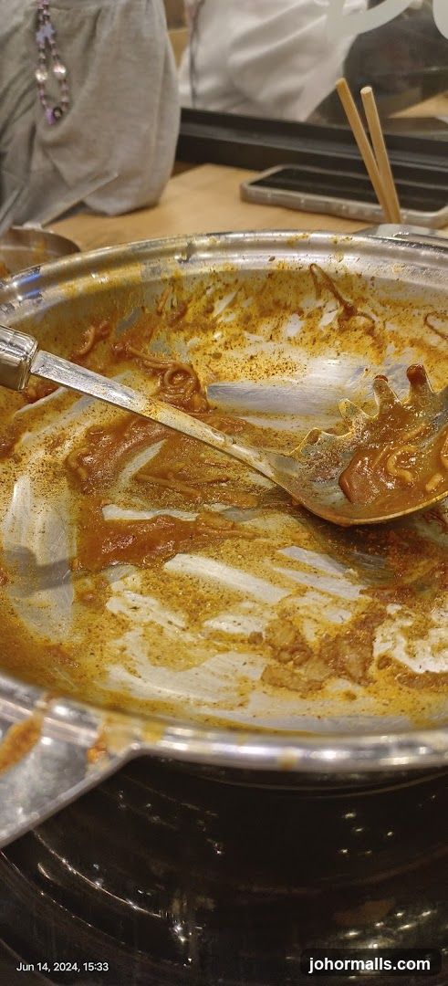 Dirty Serving Dish with Utensils