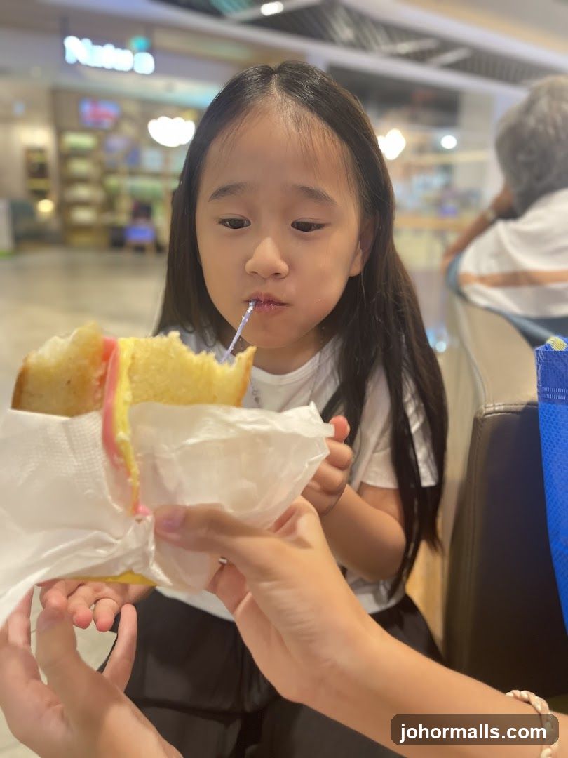 Girl Eating a Sandwich