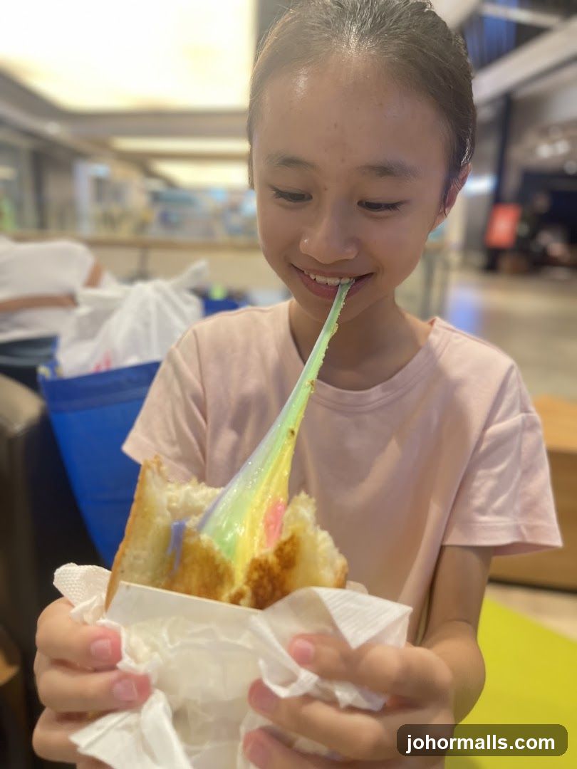 Girl eating rainbow toast