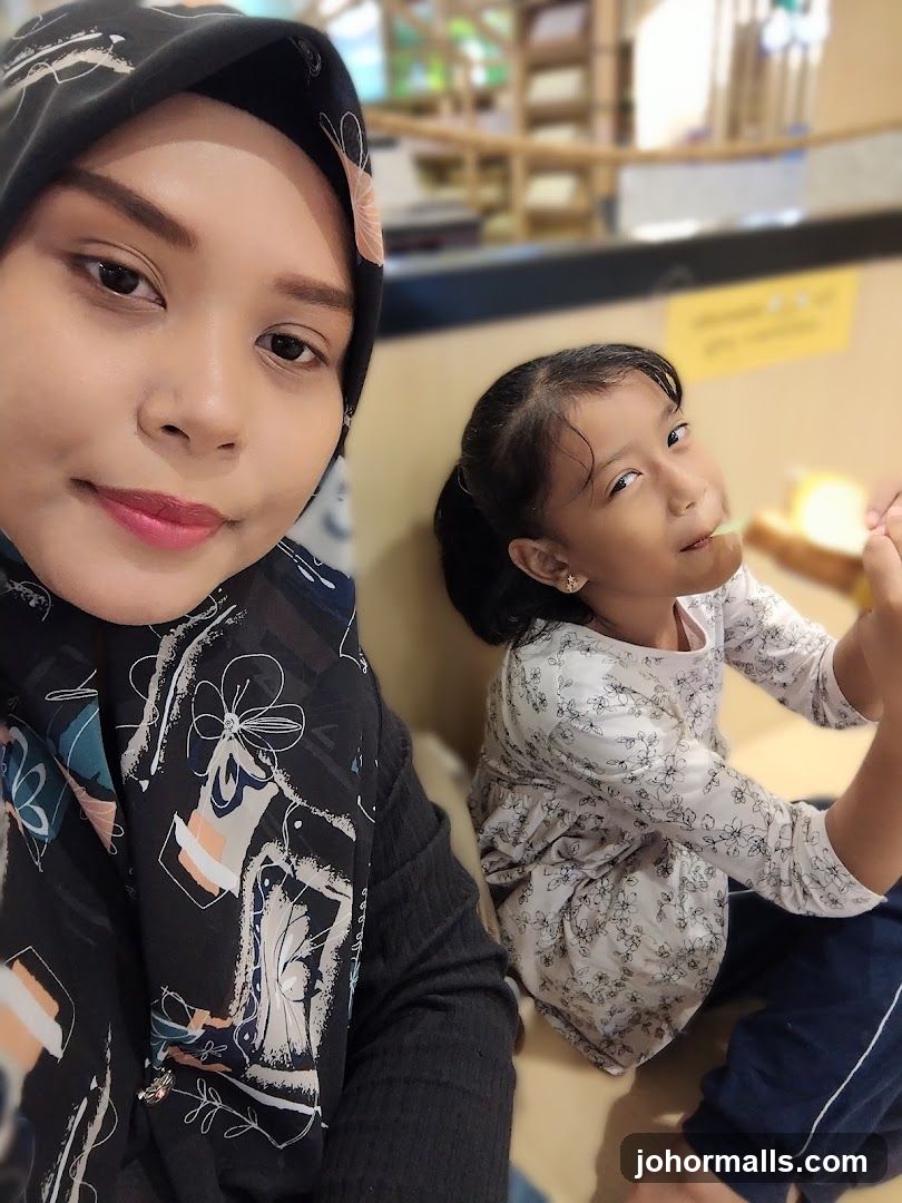 Woman and child posing for a selfie