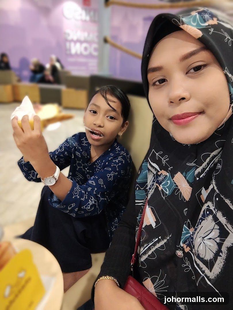 Mother and child enjoying ice cream