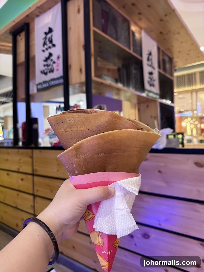 Crepe being held