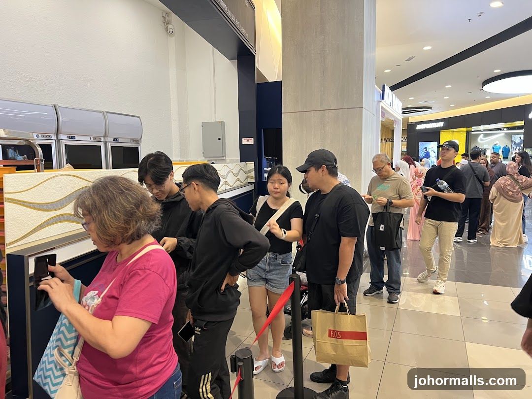 People in a queue at a store